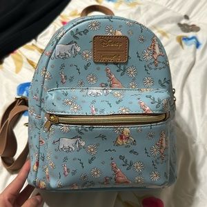 Winnie the Pooh Blue Daisy Loungefly Backpack